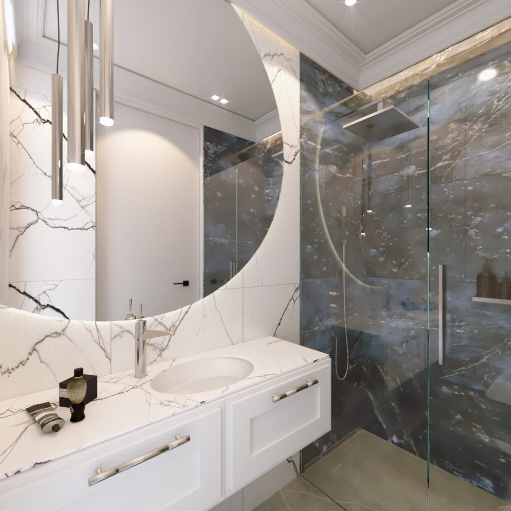 Łazienka z prysznicem za ścianą szklaną i ładnym dużym i okrągłym lustrem.