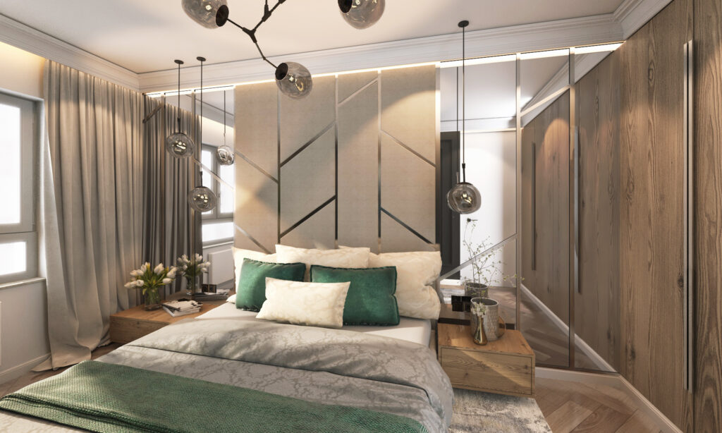 Projektant wnętrz Wrocław pokazuje na fotografii sypialnia z lustrem w tle łóżka.
